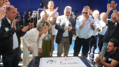 Telma Mota, presidente da Associação de Socorros, apagou as velas de mais um aniversário da instituição (Foto: Ana Alcântara)